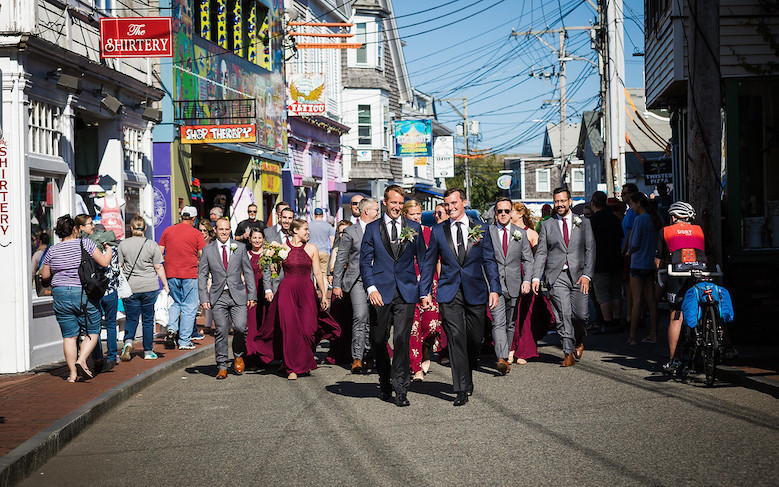 Parker and Cameron's wedding party enjoying a stroll down Commercial Street in Provincetown.  Just a short walk from the Outer Cape wedding Venue the Pilgrim Monument.